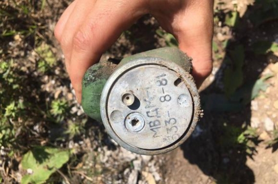 В Попасной возле здания суда нашли большой тайник с боеприпасами